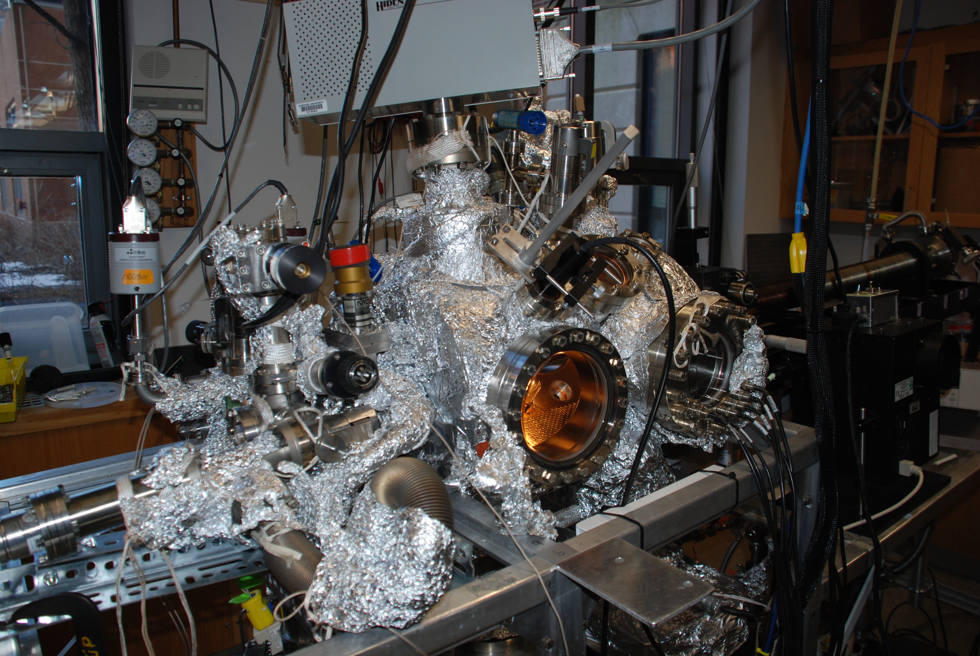 Ultrahigh vacuum system equipped for photo-induced desorption